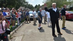 US President Donald Trump visit a neighborhood in Houston while touring areas affected by Hurricane Harvey on September 2.