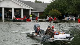 Search and rescue volunteers rescue patients from the flooded Cypress Glen nursing home in Port Arthur, Texas, on August 30.