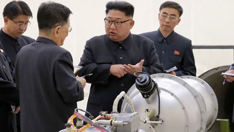 This undated picture released by North Korea's official Korean Central News Agency (KCNA) on September 3, 2017 shows North Korean leader Kim Jong Un looking at a metal casing at an undisclosed location.