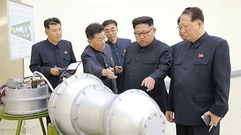 Kim Jong Un seen here in this undated photo released Sunday by North Korean state media inspecting what is claimed to be a nuclear weapon.