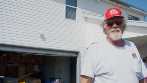 Buddy Seeds stands by one of the buildings left standing in Port Aransas.