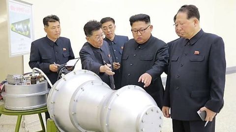 Kim Jong Un inspects what is claimed to be a nuclear device in a photo released by state media on Sunday.