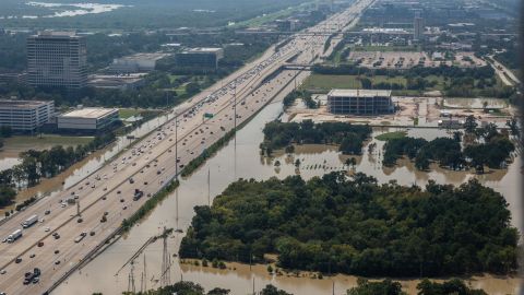Main roads into Houston are open again, bringing people back to flooded neighborhoods.