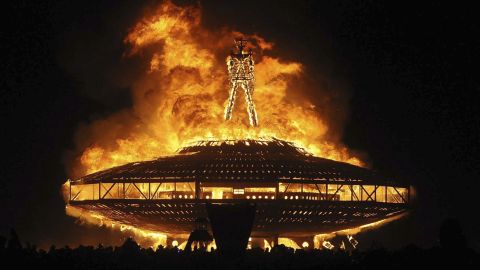 The "Man" burns on the Black Rock Desert at Burning Man in 2013. 