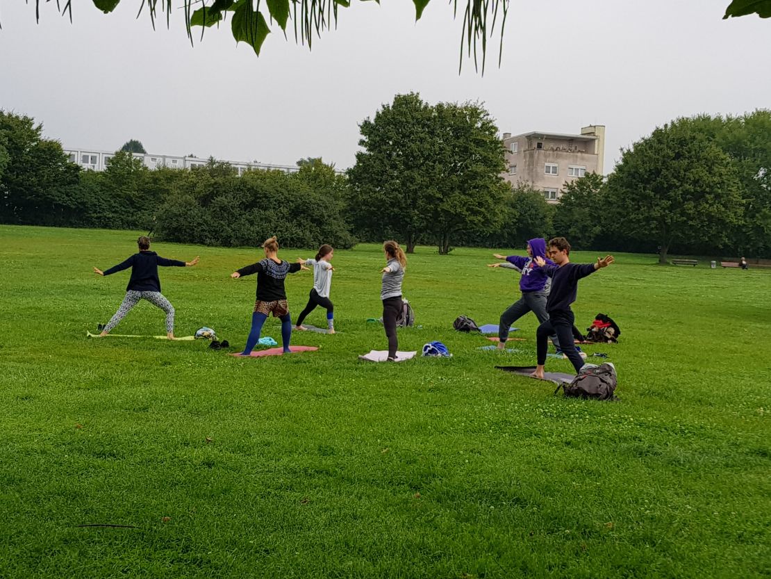 One group organized yoga for residents evacuated from their homes.