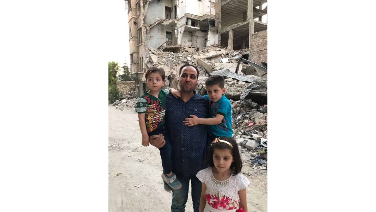 Mohammed Kheir Daqneesh with his three children. 
