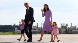 Britain's Prince William, Duke of Cambridge and his wife Kate, the Duchess of Cambridge, and their children Prince George and Princess Charlotte walk on the tarmac of the Airbus compound prior boarding their plane in Hamburg, northern Germany, on July 21,2017.
 The British royal couple are on the last stage of their three-day visit to Germany. / AFP PHOTO / POOL / Christian Charisius        (Photo credit should read CHRISTIAN CHARISIUS/AFP/Getty Images)