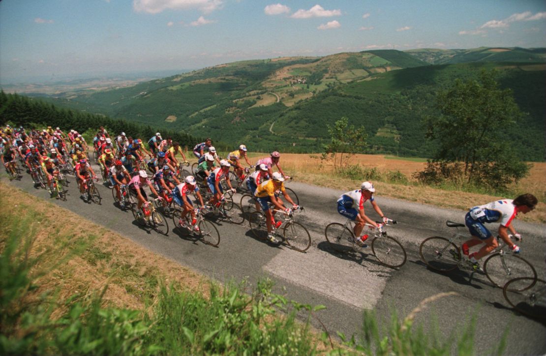 Indurain, again pictured in yellow, secured five consecutive Tour de France victories.