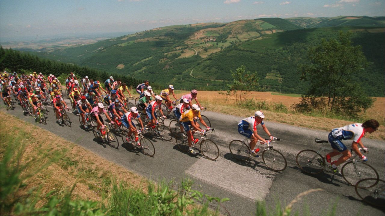 Indurain, again pictured in yellow, secured five consecutive Tour de France victories.
