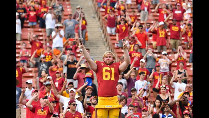 USC long snapper Jake Olson, <a target="_blank">who is blind,</a> leads the school's marching band after the football team defeated Western Michigan on Saturday, September 2. Olson <a target="_blank" target="_blank">played in a game</a> for the first time in his career, snapping the ball for a successful extra point.
