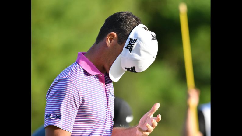 PGA Tour golfer Billy Horschel knocks his cap off his head after missing a putt in Norton, Massachusetts, on Friday, September 1.