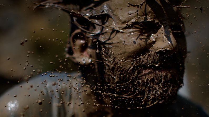 A participant gets dirty during the Xletix Challenge, an obstacle course in Wuppertal, Germany, on Sunday, September 3.