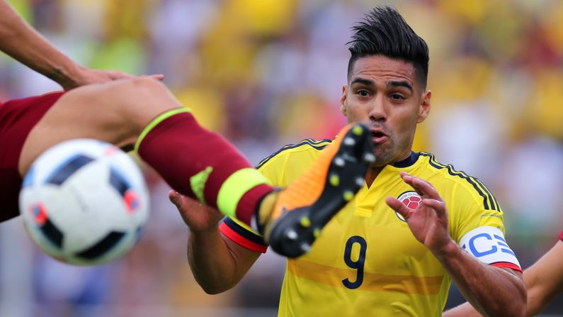 Colombian striker Radamel Falcao reacts as Venezuela's Mikel Villanueva reaches the ball during a World Cup qualifier on Thursday, August 31. The match ended scoreless.