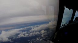 airplane flies through hurricane irma