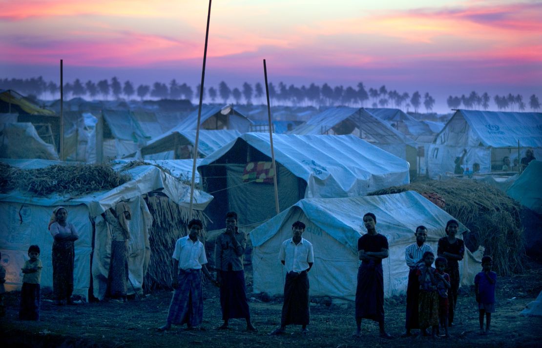 Rohingya refugees stand at a crowded camp in 2012 on the outskirts of Sittwe, Myanmar.