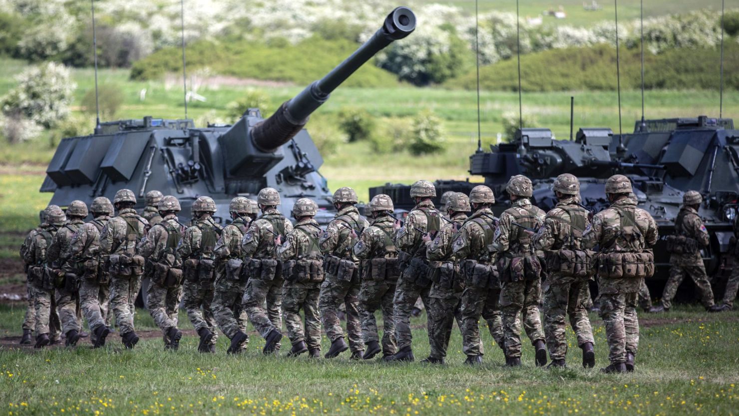 Four British soldiers have been arrested by authorities on suspicion of preparing acts of terror.