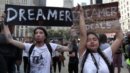 Gloria Mendoza wipes back tears as she protests with Jovan Rodrigo and other "Dreamers" near Trump Tower in New York City on September 5 after the Trump administration announced its decision to end the DACA program.