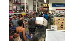 In San Juan, people stood on long lines Tuesday afternoon at a Sam's Club.