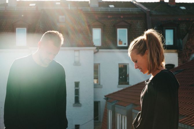 <strong>Portrait painting:</strong> The photographer scaled their Berlin roof to take this atmospheric image of the couple.