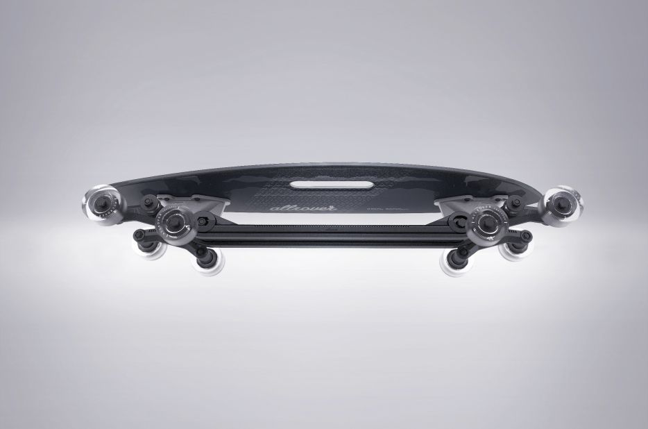 The engine-powered skateboard's four pairs of wheels can move independently, allowing the user to ride down stairs and other uneven surfaces. (Stair-Rover © 2014 Po-Chih Lai/Allrover Ltd)