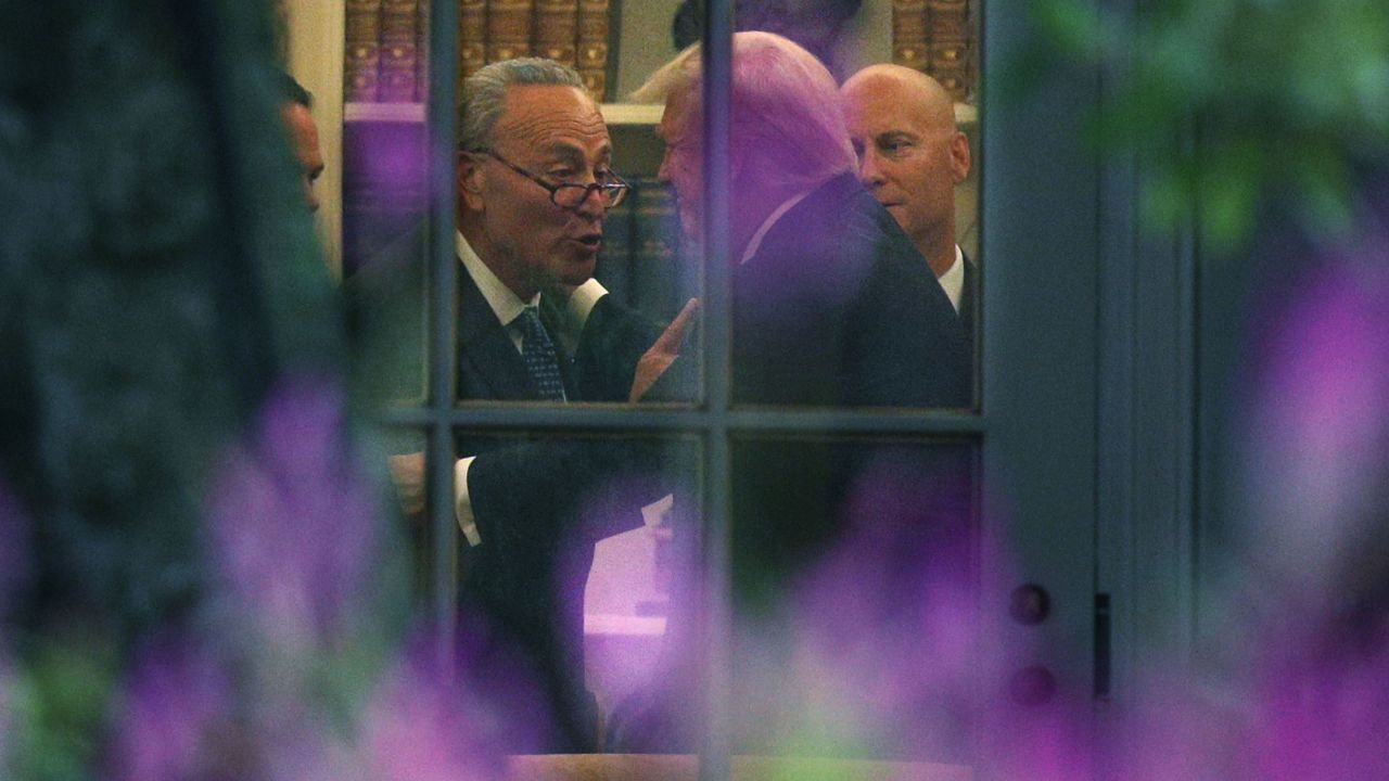 WASHINGTON, DC - SEPTEMBER 06: U.S. Senate Minority Leader Chuck Schumer (D-NY) (L) makes a point to President Donald Trump in the Oval Office prior to his departure from the White House September 6, 2017 in Washington, DC. President Trump is traveling to North Dakota for a tax reform event with workers from the energy sector. (Photo by Alex Wong/Getty Images)