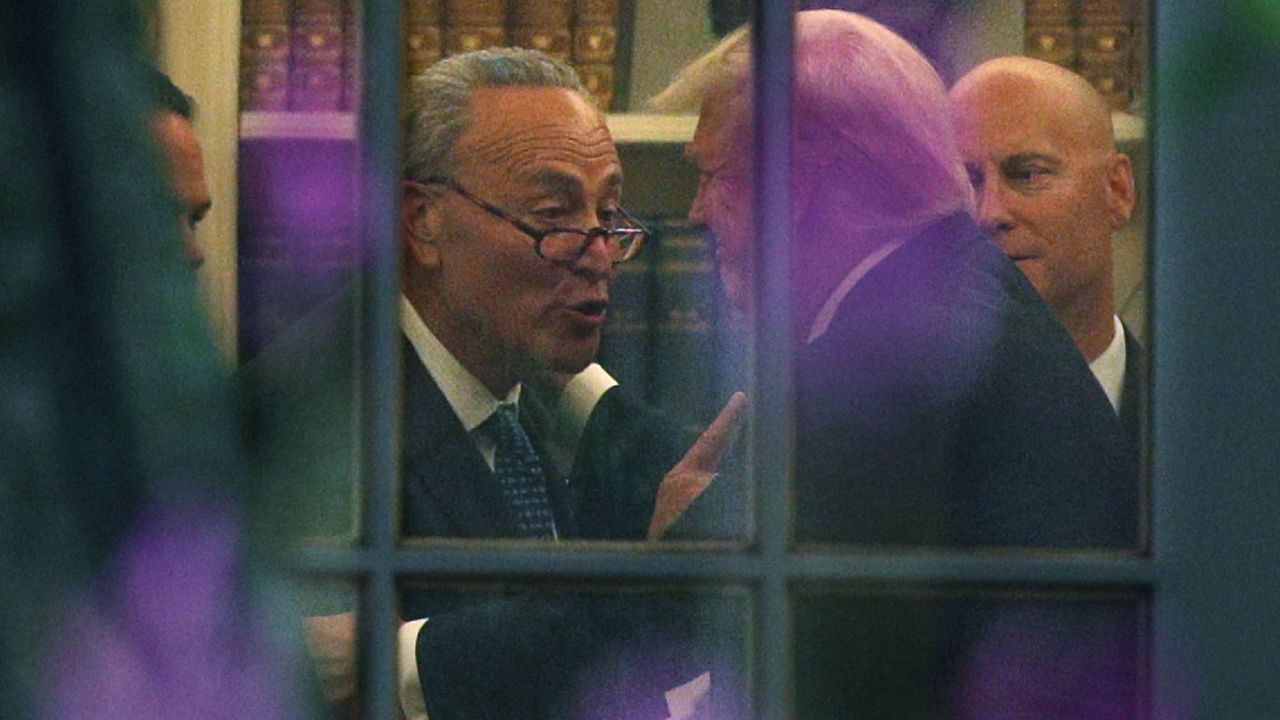 WASHINGTON, DC - SEPTEMBER 06:  U.S. Senate Minority Leader Chuck Schumer (D-NY) (L) makes a point to President Donald Trump in the Oval Office prior to his departure from the White House September 6, 2017 in Washington, DC. President Trump is traveling to North Dakota for a tax reform event with workers from the energy sector.  (Photo by Alex Wong/Getty Images)