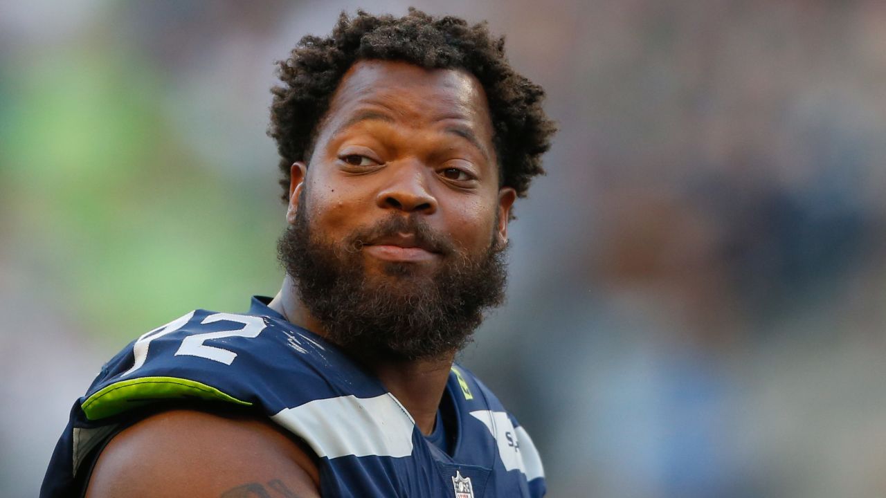 Defensive end Michael Bennett #72 of the Seattle Seahawks looks on during the game against the Kansas City Chiefs at CenturyLink Field on August 25, 2017 in Seattle, Washington.  