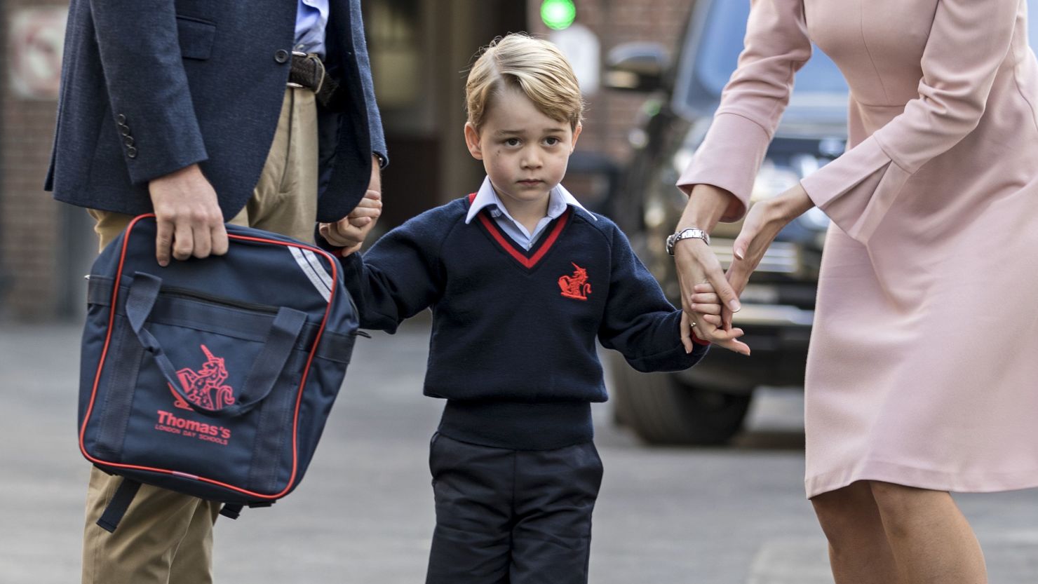 Britain's Prince George arrives for his first day of school at Thomas's Battersea on September 7, 2017.