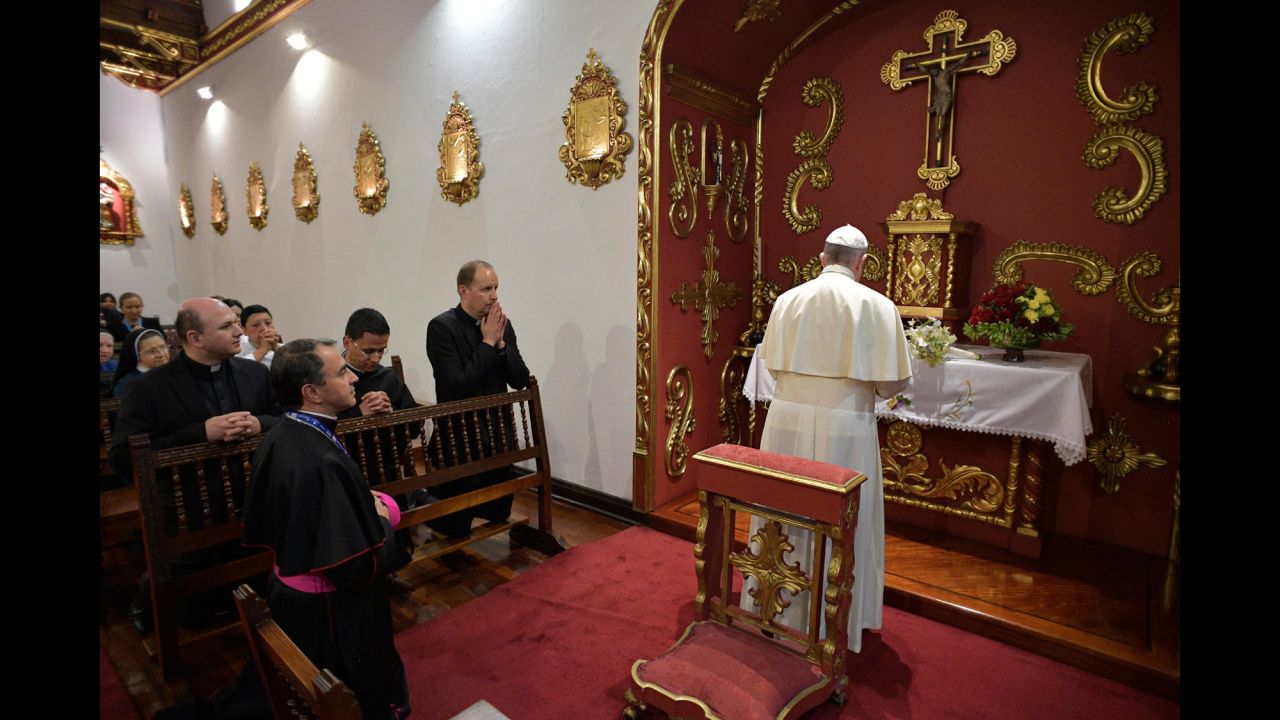 Pope Francis prays in the chapel of the Nunciature in Bogota on September 6.