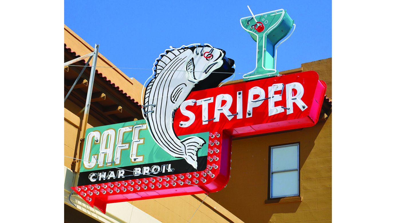 <strong>The Striper Cafe sign in Rio Vista, California</strong>: It's important that fans of road signs make their voices heard, says Seltzer. "Tell a business owner how much you love their sign and they might find more value in it," she says. This 1950s sign was restored by an anonymous donor in 2015. The cafe no longer serves alcohol but the martini glass was left intact.