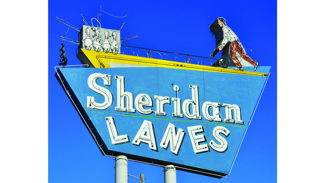 <strong>The Sheridan Lanes sign in Tulsa, Oklahoma: </strong>"When [the owners] talk about how they are thinking about getting it repainted, you tell them, 'no - don't, don't cheese it up. It's historic the way it is,'" says Seltzer. Case in point: this Claude Neon-built sign dates back to the 1950s. In 1998, the bowling alley was purchased by the AMF chain and the sign was taken down. After pressure from the community, the sign was reinstalled.