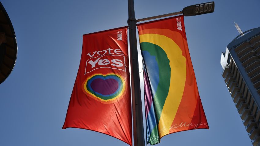 A "Vote Yes" banner in support of same sex-marriage hangs on a street in Sydney on September 5, 2017. 
Same-sex marriage advocates launched legal action in Australia's highest court on September 5, 2017 against a controversial government plan for a postal vote on the issue, calling it divisive and harmful. / AFP PHOTO / PETER PARKS        (Photo credit should read PETER PARKS/AFP/Getty Images)