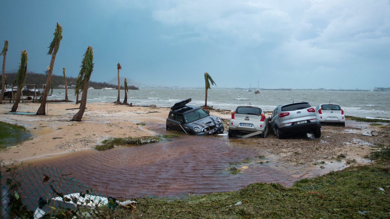 Damaged cars are seen on a St. Martin beach on September 6.