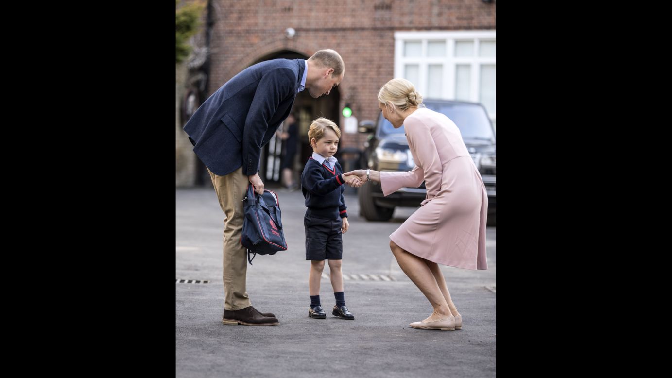 Britain's Prince George arrives for <a href="http://www.cnn.com/2017/09/07/europe/prince-george-first-day-school/index.html" target="_blank">his first day of school</a> and is greeted by Helen Haslem, the head of the lower school, on Thursday, September 7. George was brought to school by his father, Prince William.