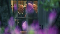 WASHINGTON, DC - SEPTEMBER 06:  U.S. Senate Minority Leader Chuck Schumer (D-NY) (L) makes a point to President Donald Trump in the Oval Office prior to his departure from the White House September 6, 2017 in Washington, DC. President Trump is traveling to North Dakota for a tax reform event with workers from the energy sector.  (Photo by Alex Wong/Getty Images)