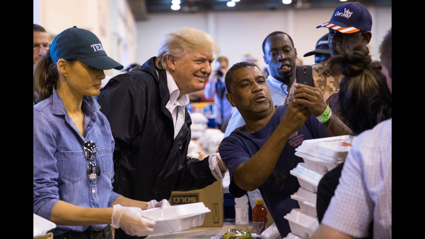 A man takes a selfie with President Donald Trump in Houston as Trump <a href="http://www.cnn.com/2017/09/02/politics/donald-trump-texas-harvey/index.html" target="_blank">handed out food</a> to Hurricane Harvey evacuees on Saturday, September 2.