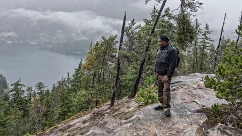 Alan Spears, director of cultural resources in the government affairs department at the National Parks Conservation Association, surveys Diablo Lake in North Cascades National Park in Washington state. 