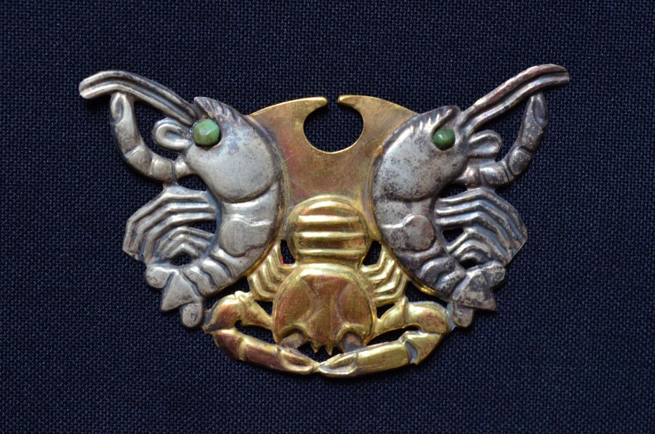 Made from both gold and silver, this three-inch-wide ornament was made by the Moche civilization in modern-day Peru.