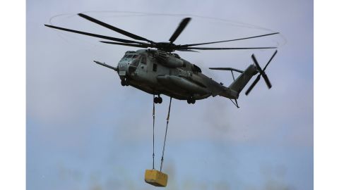 A CH-53E Super Stallion carries a 20,000-pound training load during external lift training at Marine Corps Base Camp Pendleton in California on June 5. 