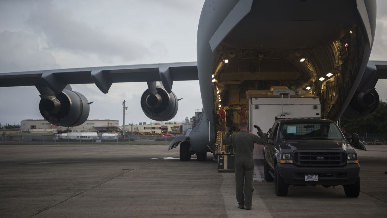 U.S. Air Force C-17 Globemaster III crewmembers from the 14th Airlift Squadron unload supplies during a hurricane relief mission to prepare Puerto Rico for Hurricane Irma at San Juan, Puerto Rico, September 6, 2017. 