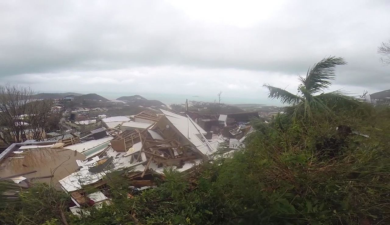 In this image made from video, damaged houses are seen in St. Thomas on September 7.