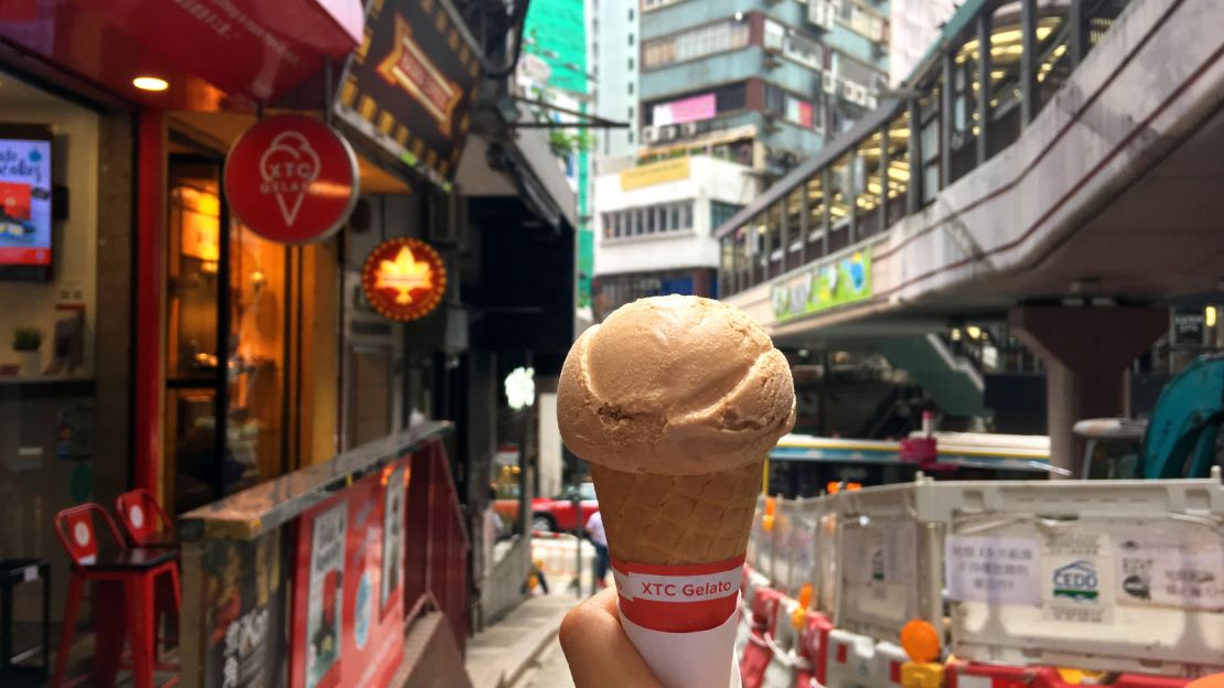 Savoring Cantonese milk tea and cooling off at the same time.