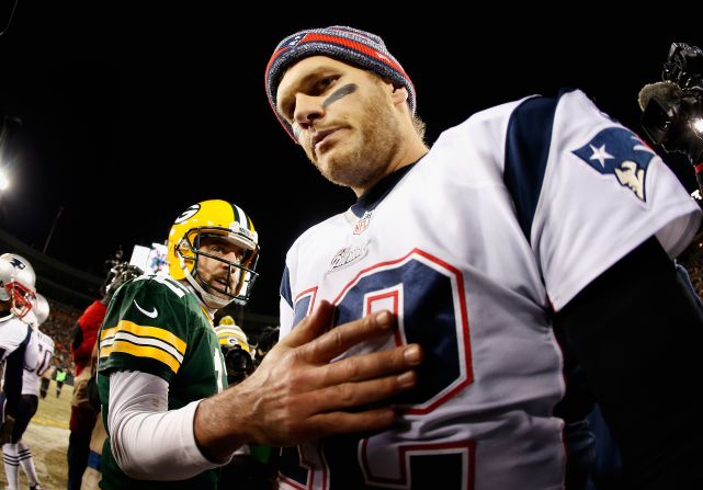 Though Aaron Rodgers (left) and Tom Brady are arguably the two best quarterbacks in the NFL, both are outside the elite level of earners this season. Here are the top 20 highest-paid NFL players for 2017, based on average yearly salaries in their contracts. (Source: NFL.com)