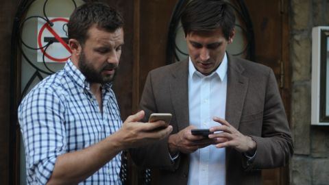 Vitali Shkliarov (L) with opposition politician Dmitry Gudkov.