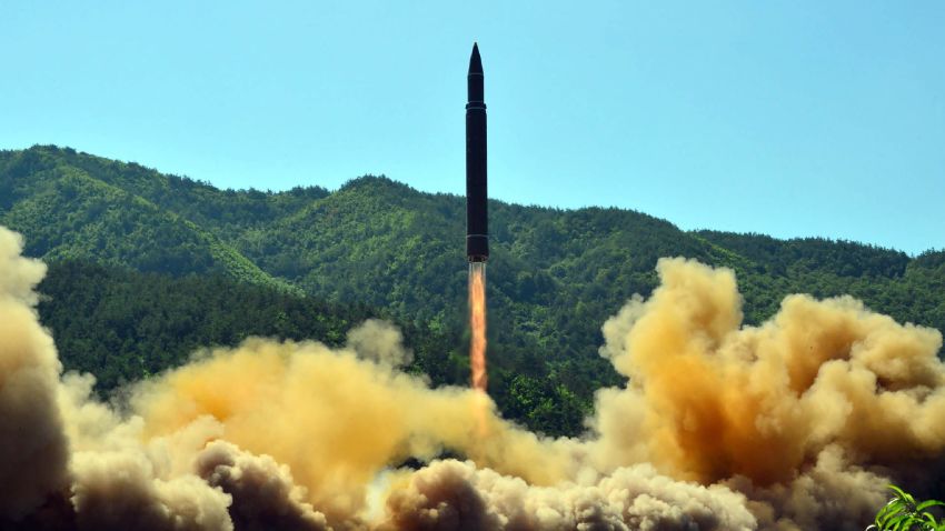 TOPSHOT - This picture taken on July 4, 2017 and released by North Korea's official Korean Central News Agency (KCNA) on July 5, 2017 shows the successful test-fire of the intercontinental ballistic missile Hwasong-14 at an undisclosed location.
South Korea and the United States fired off missiles on July 5 simulating a precision strike against North Korea's leadership, in response to a landmark ICBM test described by Kim Jong-Un as a gift to "American bastards". / AFP PHOTO / KCNA VIA KNS / STR / South Korea OUT / REPUBLIC OF KOREA OUT   ---EDITORS NOTE--- RESTRICTED TO EDITORIAL USE - MANDATORY CREDIT "AFP PHOTO/KCNA VIA KNS" - NO MARKETING NO ADVERTISING CAMPAIGNS - DISTRIBUTED AS A SERVICE TO CLIENTS
THIS PICTURE WAS MADE AVAILABLE BY A THIRD PARTY. AFP CAN NOT INDEPENDENTLY VERIFY THE AUTHENTICITY, LOCATION, DATE AND CONTENT OF THIS IMAGE. THIS PHOTO IS DISTRIBUTED EXACTLY AS RECEIVED BY AFP. 

 /         (Photo credit should read STR/AFP/Getty Images)