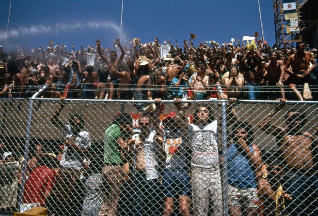 Crowds of excited fans watch the 1973 Brazilian Grand Prix -- the first world championship held in the country -- under the blazing sun.