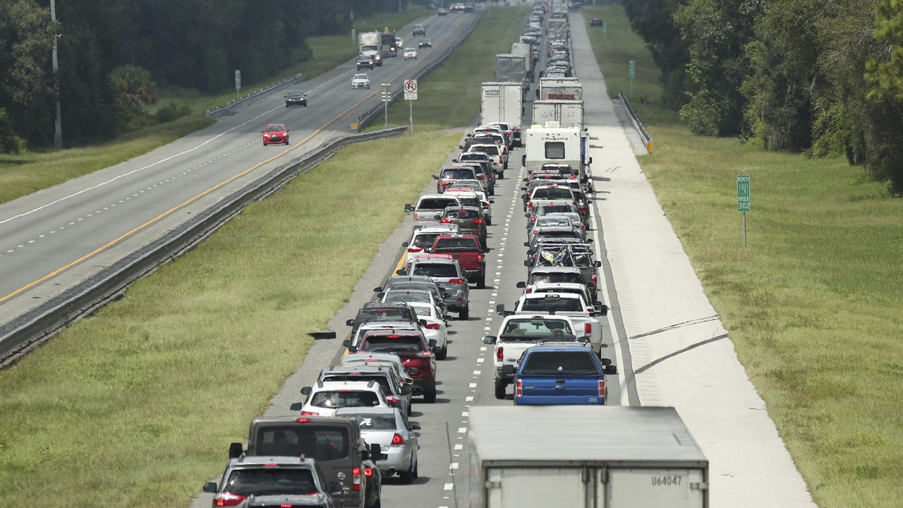 Traffic slows to a crawl Friday on the northbound lanes of Florida's Turnpike near I-75 in Wildwood.