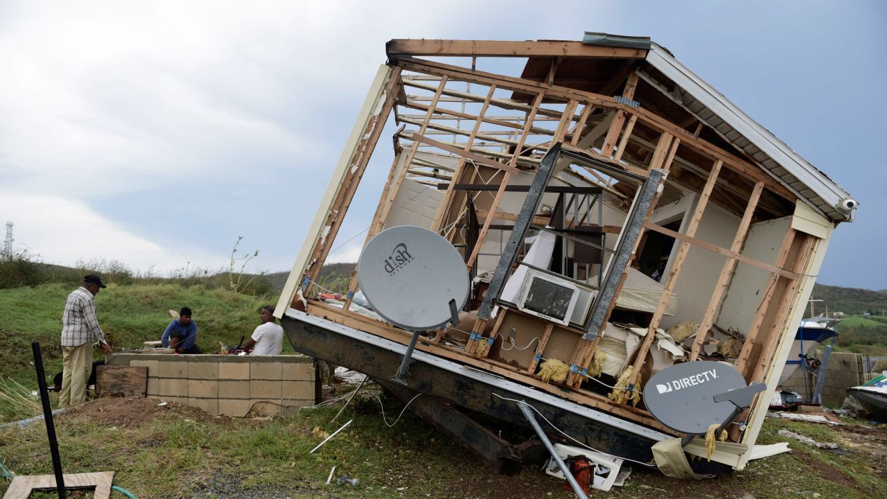 A damaged home is tilted onto its side on the Puerto Rican island of Culebra on Thursday, September 7.