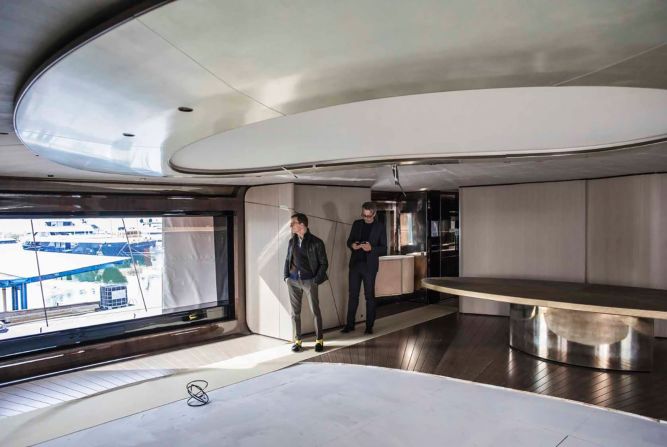 Architect and interior designer Achille Salvagni and Rossinavi COO Federico Rossi survey the Aurora; interior elements will be put in place once the ship is in the water.