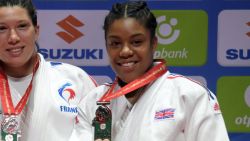 Medalists of the womens -57kg category, (L-R) Japan's Tsukasa Yoshida with the silver, Mongolia's Sumiya Dorjsuren with the gold, France's Helene Receveaux and Great Britain's Nekoda Smythe-Davis with the bronze celebrate on the podium during the medal ceremony at the World Judo Championships in Budapest on August 30, 2017.   / AFP PHOTO / ATTILA KISBENEDEK        (Photo credit should read ATTILA KISBENEDEK/AFP/Getty Images)